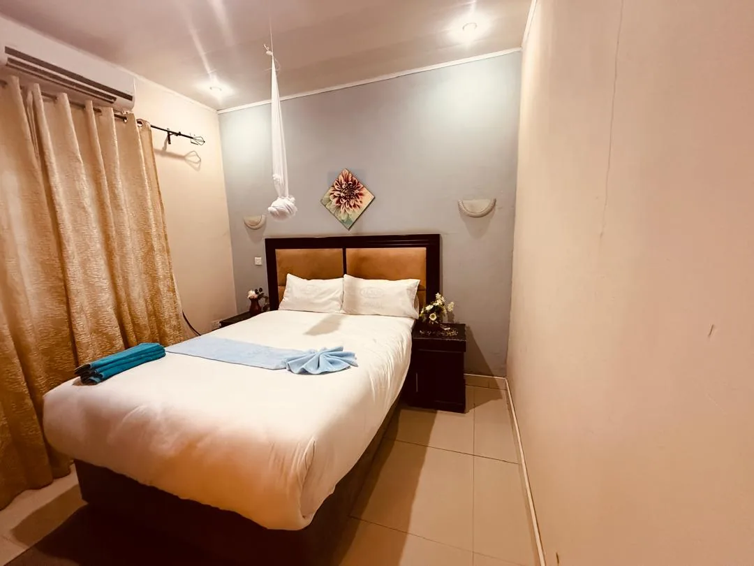 Royal Olympia Lodges & Safaris guest room